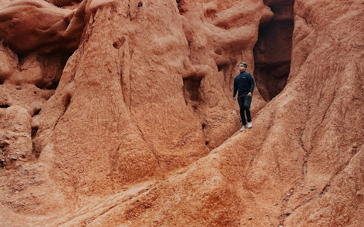 A Person Standing by a Rock Formation from Chrome web store to be run with OffiDocs Chromium online A Person Standing by a Rock Formation from Chrome web store to be run with OffiDocs Chromium online