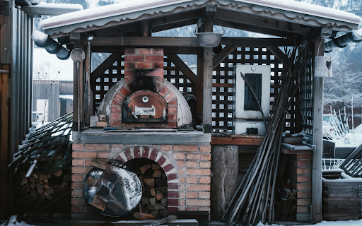Cozy Outdoor Pizza Oven in Snowy Setting from Chrome web store to be run with OffiDocs Chromium online Cozy Outdoor Pizza Oven in Snowy Setting from Chrome web store to be run with OffiDocs Chromium online