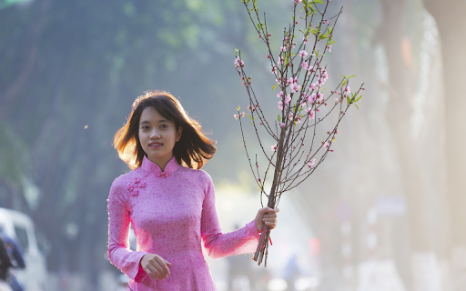 Girl holding a peach branch from Chrome web store to be run with OffiDocs Chromium online Girl holding a peach branch from Chrome web store to be run with OffiDocs Chromium online