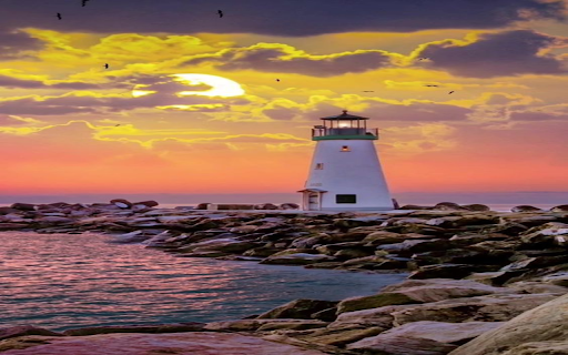 Lighthouse at sunset wallpaper from Chrome web store to be run with OffiDocs Chromium online Lighthouse at sunset wallpaper from Chrome web store to be run with OffiDocs Chromium online