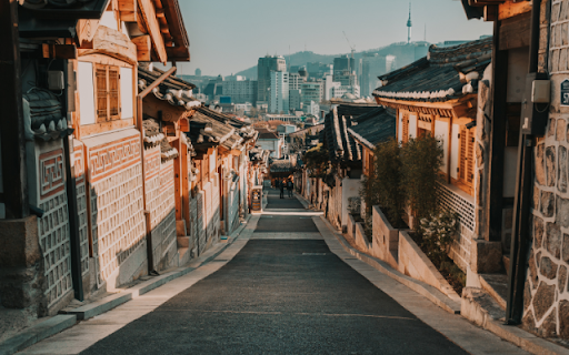 Traditional Village Lane Leading to Modern Skyline from Chrome web store to be run with OffiDocs Chromium online Traditional Village Lane Leading to Modern Skyline from Chrome web store to be run with OffiDocs Chromium online