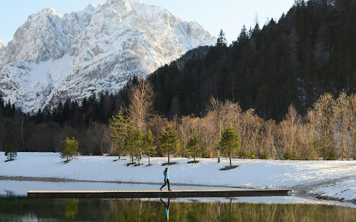 Woman Walking on a Pier on a Lake in a Valley from Chrome web store to be run with OffiDocs Chromium online Woman Walking on a Pier on a Lake in a Valley from Chrome web store to be run with OffiDocs Chromium online