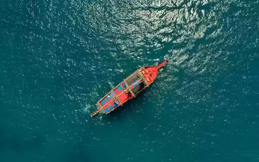 A graceful sailboat glides across the calm from Chrome web store to be run with OffiDocs Chromium online A graceful sailboat glides across the calm from Chrome web store to be run with OffiDocs Chromium online