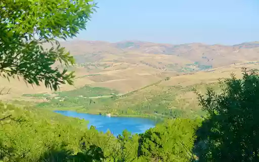 Green lake between mountains and hills from Chrome web store to be run with OffiDocs Chromium online Green lake between mountains and hills from Chrome web store to be run with OffiDocs Chromium online